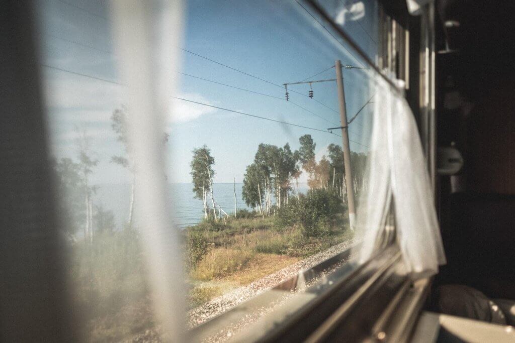 A view from Window in Train. Image: Patrick Schneider, Unsplash. 